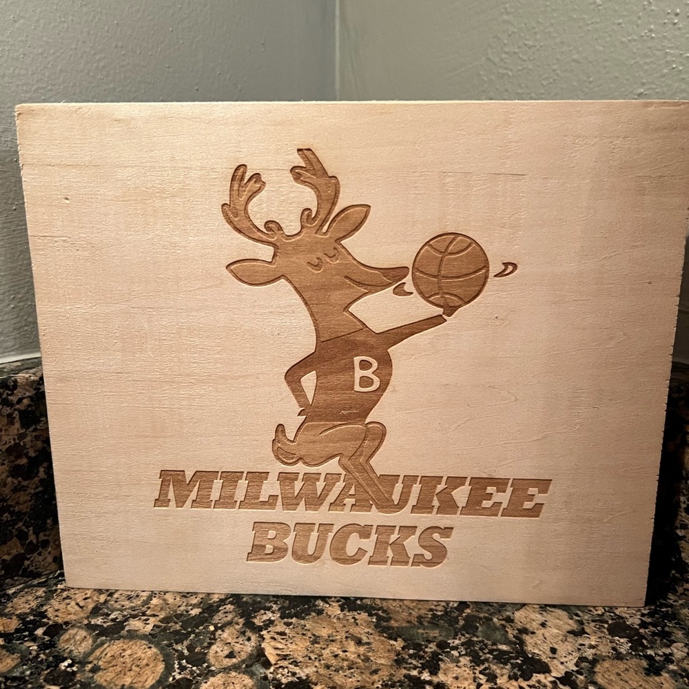 Milwaukee Bucks engraved mascot, into wood.